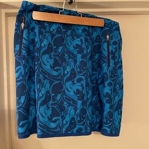 Blue skort with zip pockets and shorts attached